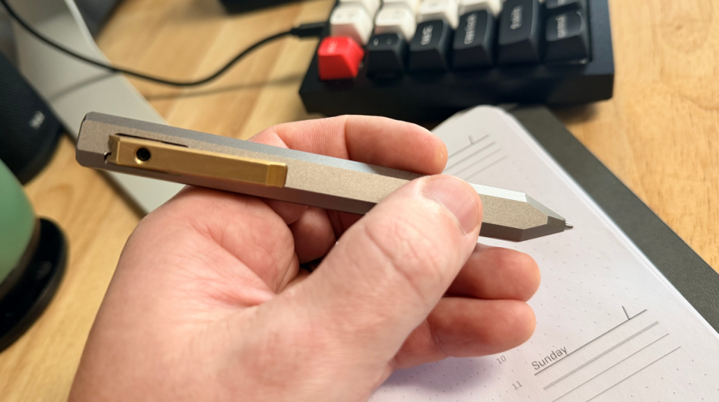The PROOF Vanguard Pen as held in a hand